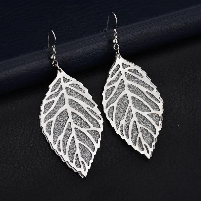 2024 Blue And White Metal Leaf Earrings Women's - Trendy Mix