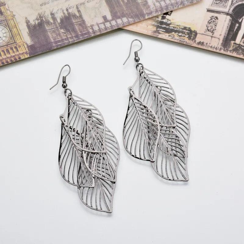 2024 Blue And White Metal Leaf Earrings Women's - Trendy Mix