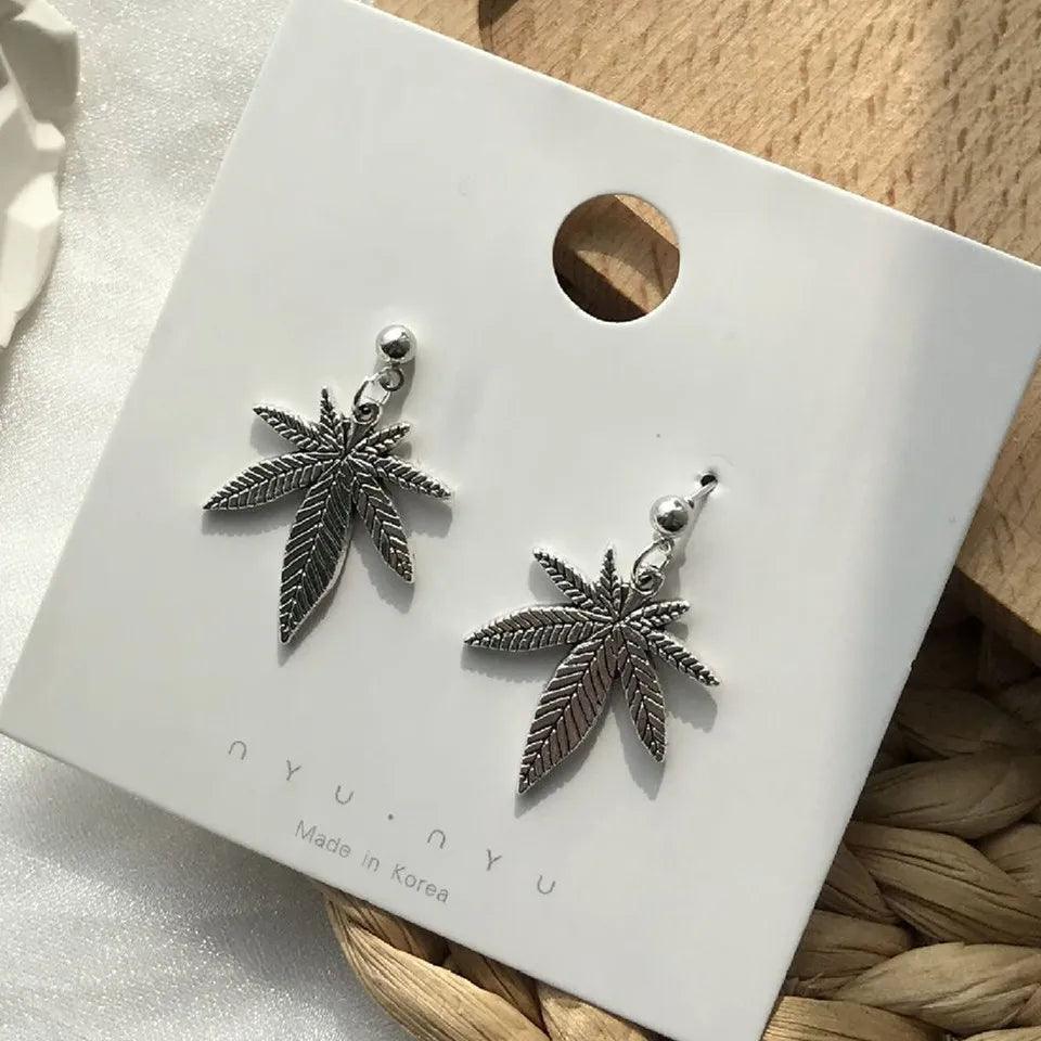 2024 Blue And White Metal Leaf Earrings Women's - Trendy Mix