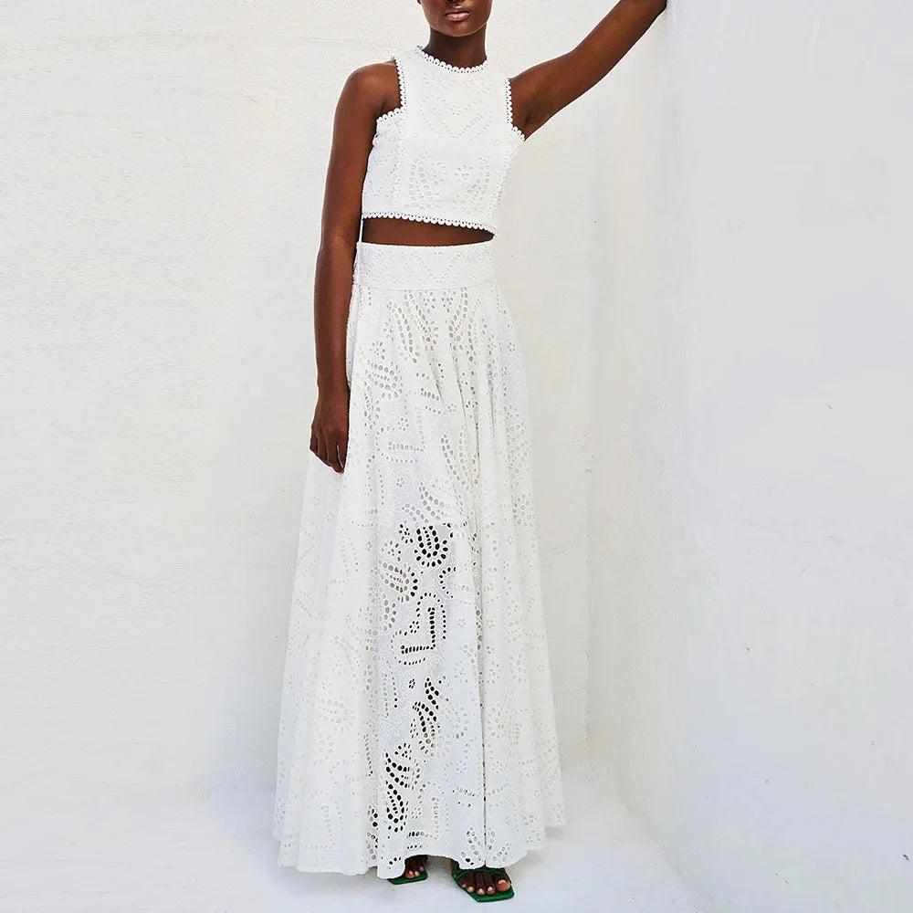 Pairing a hollow-out embroidered top with a high-waist A-line skirt - Trendy Mix