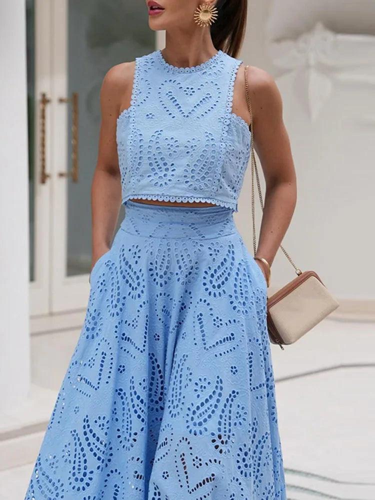 Pairing a hollow-out embroidered top with a high-waist A-line skirt - Trendy Mix