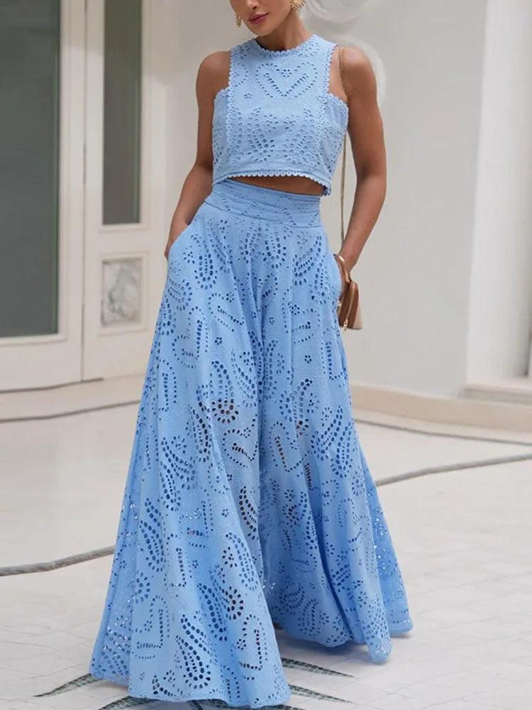 Pairing a hollow-out embroidered top with a high-waist A-line skirt - Trendy Mix