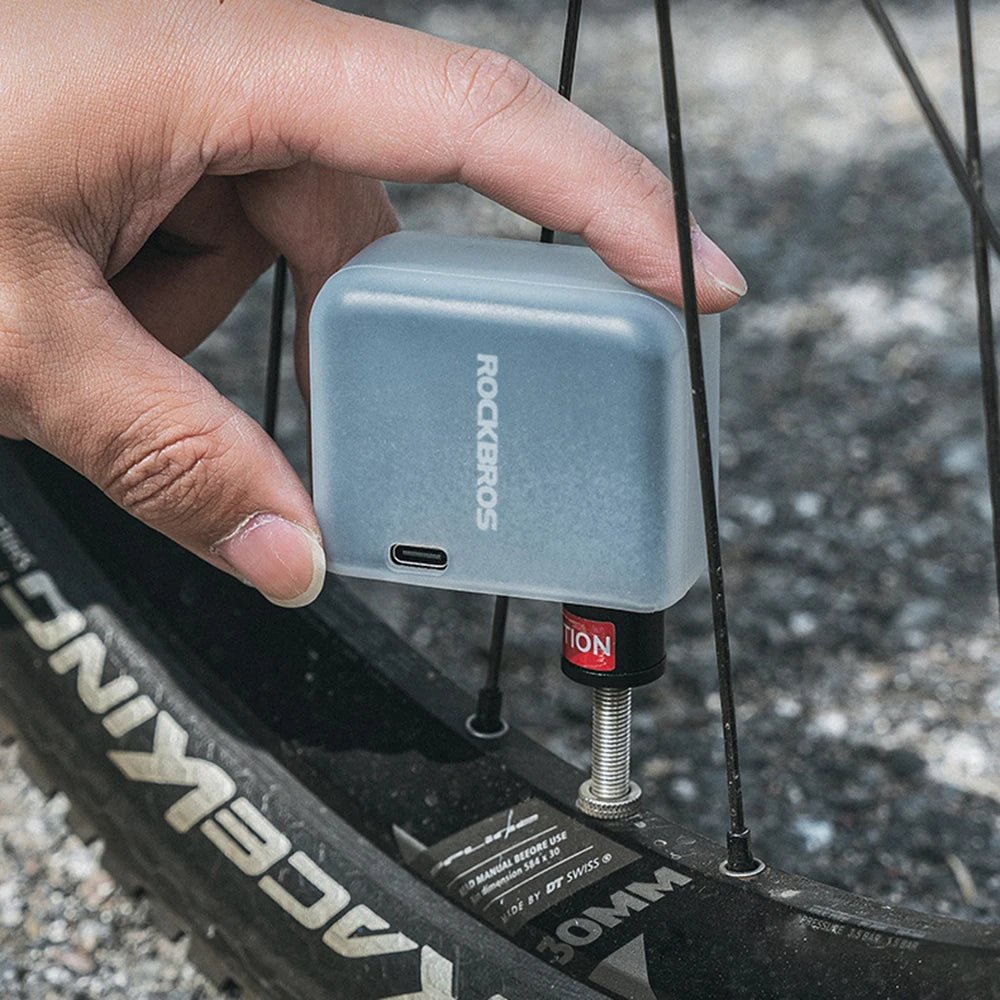 Portable electric air pump for cycling