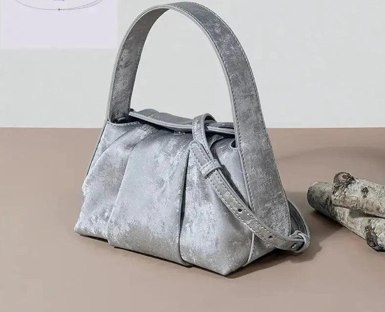 Sustainable Elegance Satin Cowhide Dumpling Handbag - Trendy Mix