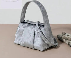 Sustainable Elegance Satin Cowhide Dumpling Handbag - Trendy Mix