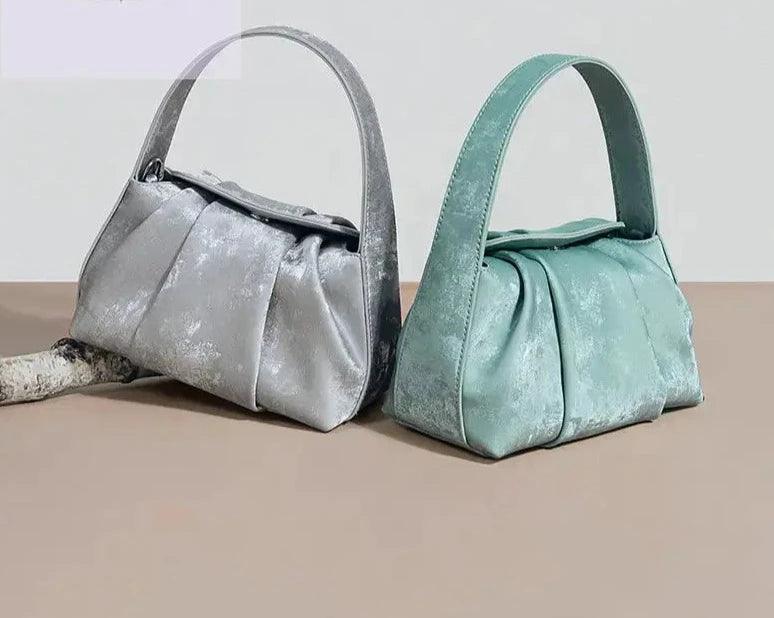 Sustainable Elegance Satin Cowhide Dumpling Handbag - Trendy Mix