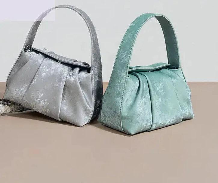 Sustainable Elegance Satin Cowhide Dumpling Handbag - Trendy Mix